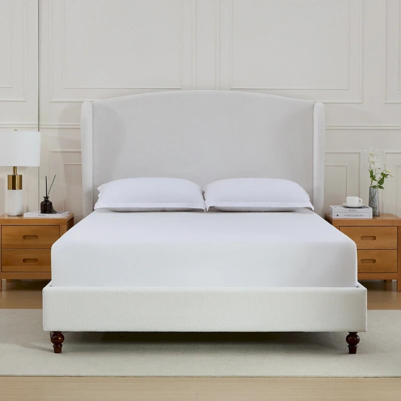 Letto a piattaforma imbottito con testiera ad ali e gambe in noce