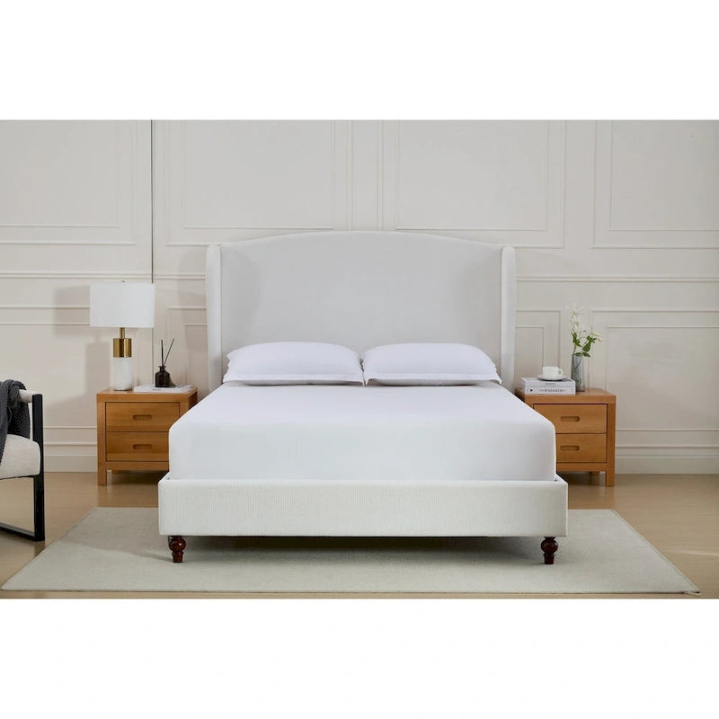 Letto a piattaforma imbottito con testiera ad ali e gambe in noce